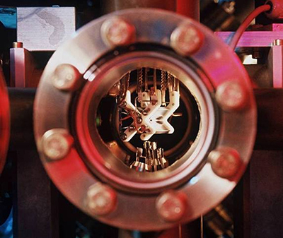 Photograph of the Paul trap was used to create a five-qubit quantum computer